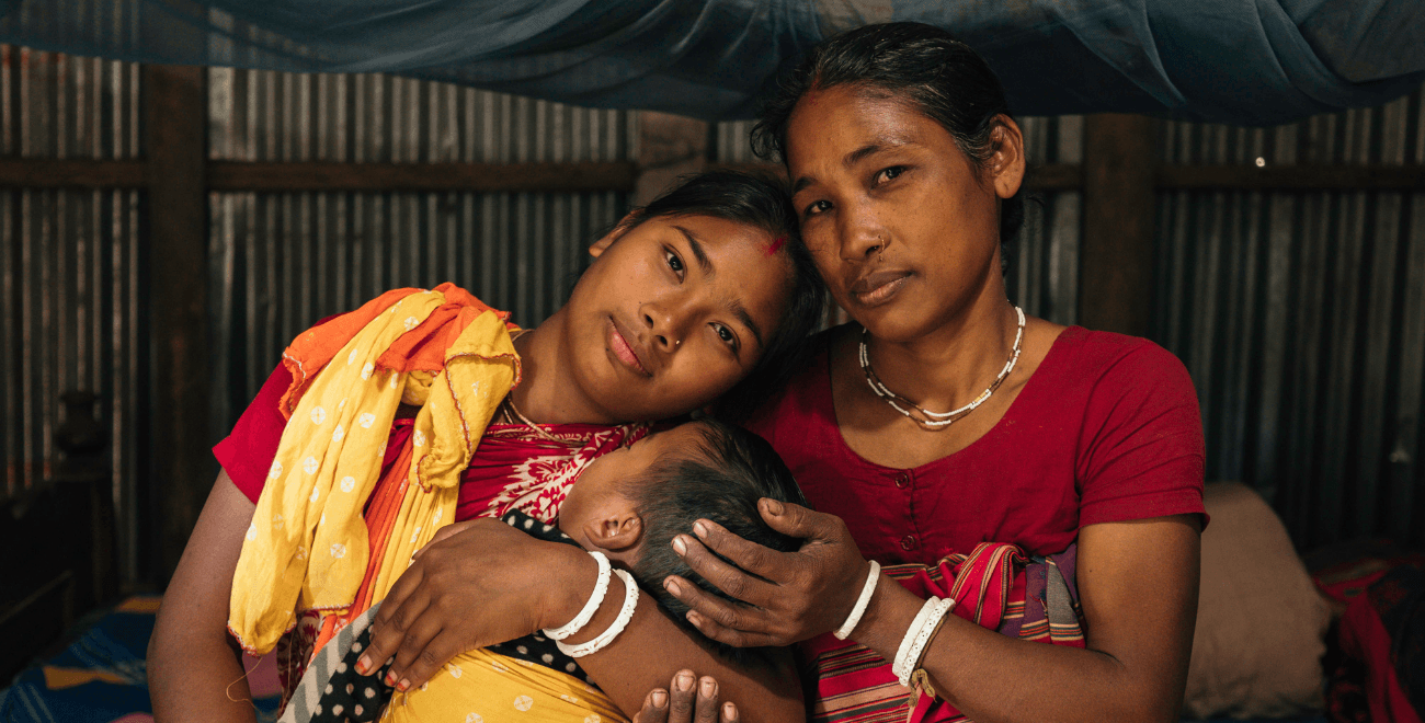 Minita, mother to Kohima, with her baby Joy