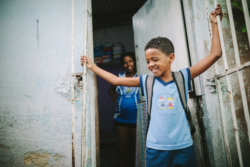 Emidio outside his home