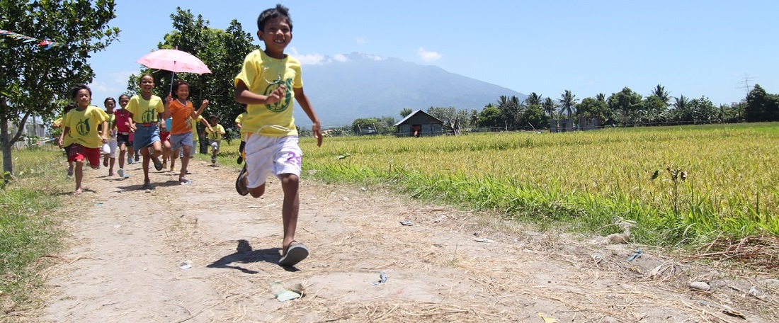 Children running in the Philippines