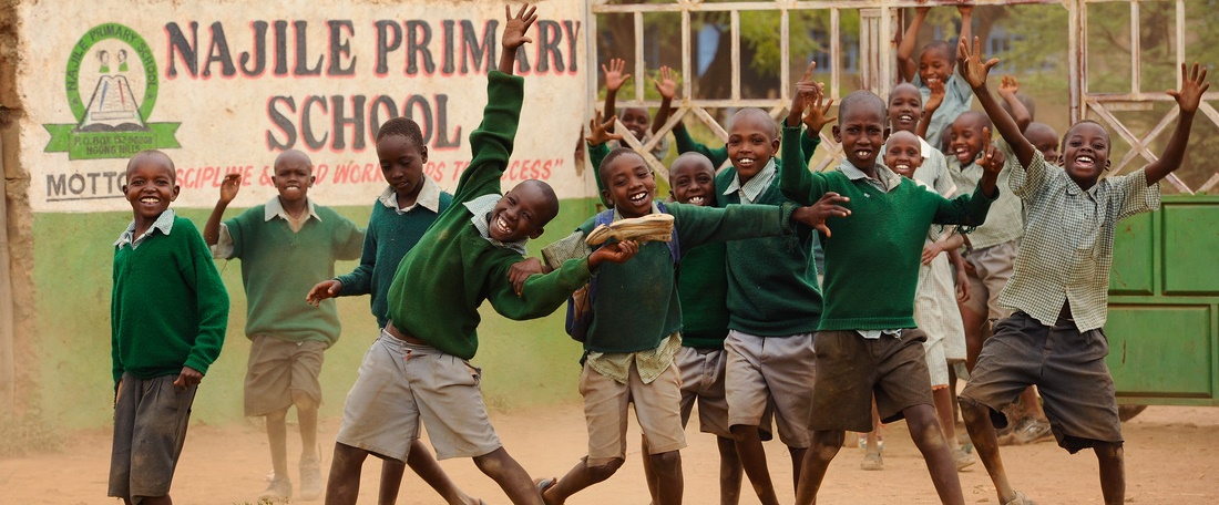 Kenya school boys outside the gates