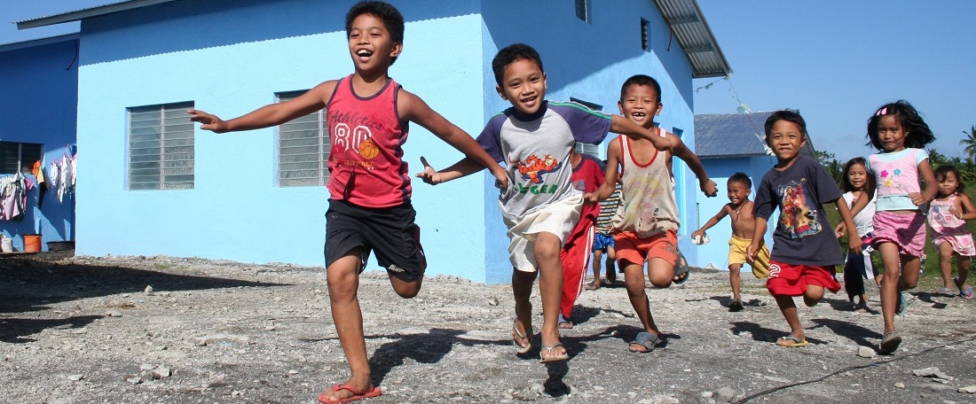 Children running in the Philippines