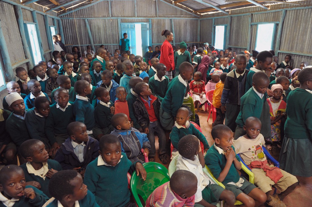 Every project day, children gather together to share devotional time and sing songs of worship.