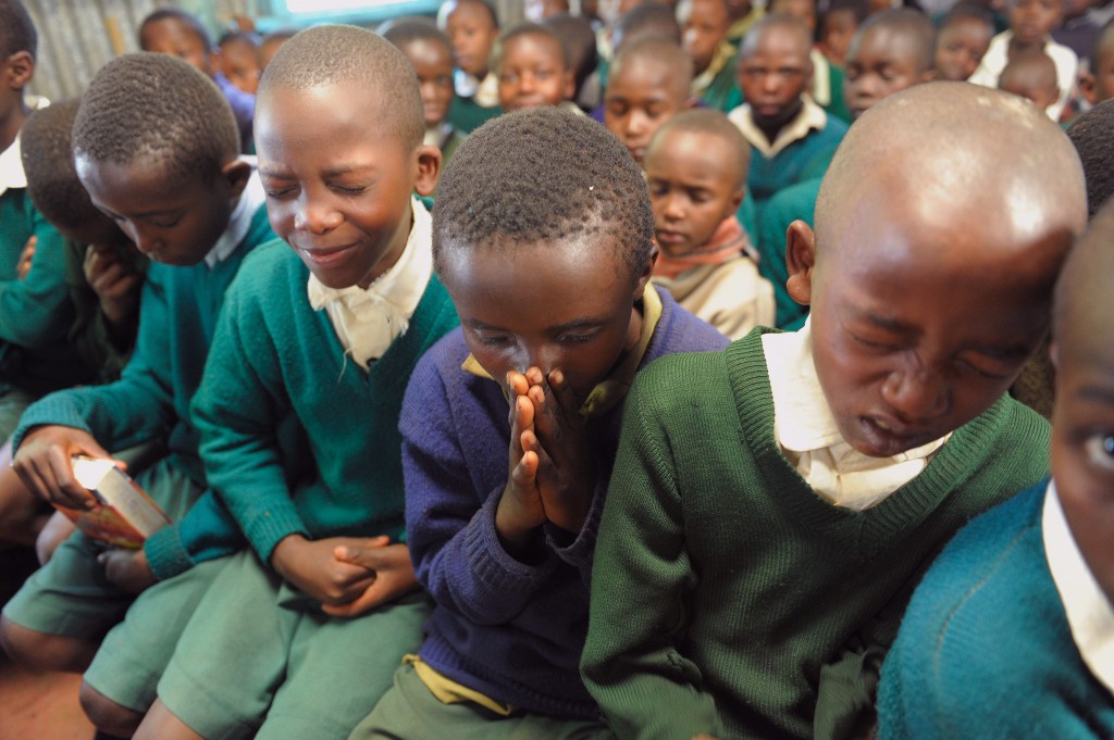 Sponsored children pray