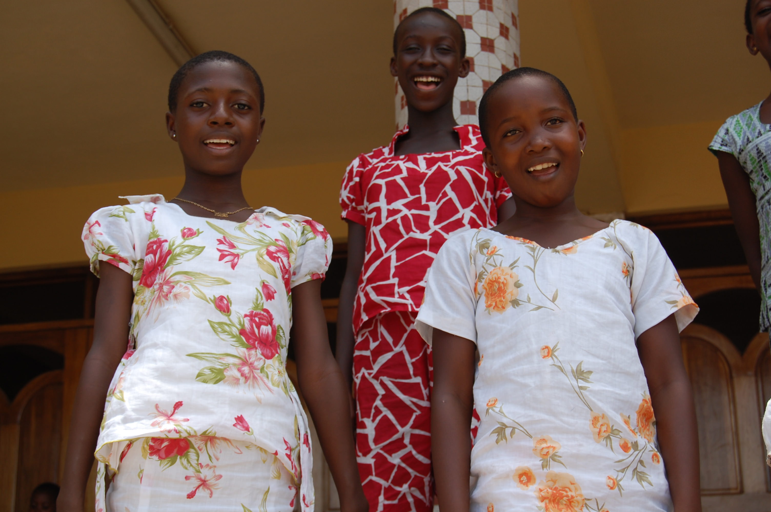 Sponsored children in Ghana with their Christmas dresses