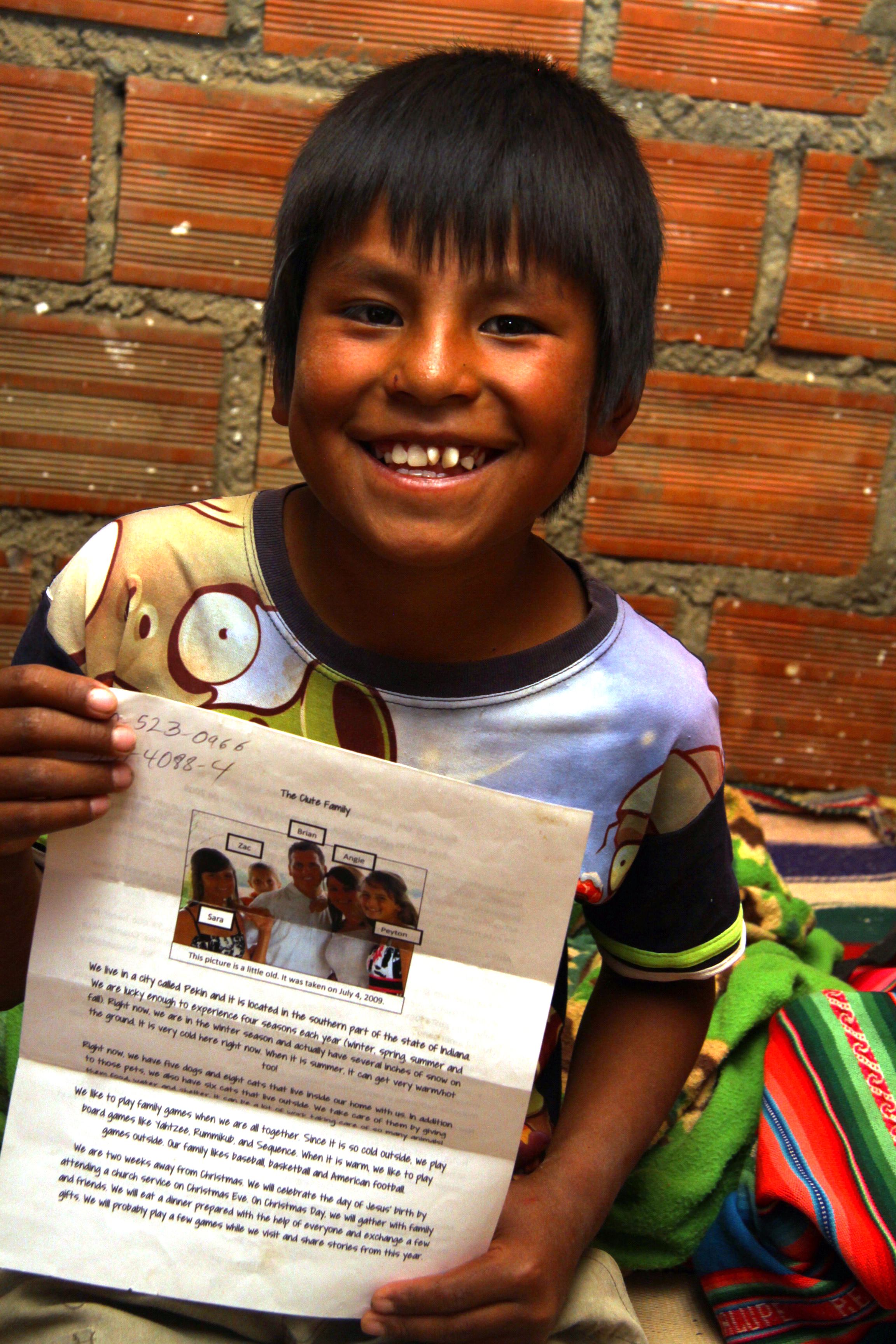 Bolivian sponsored child with letters