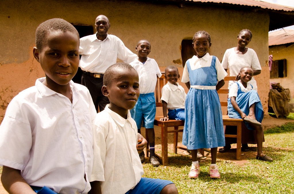 Sponsored child Julius with his adapted family in Kenya