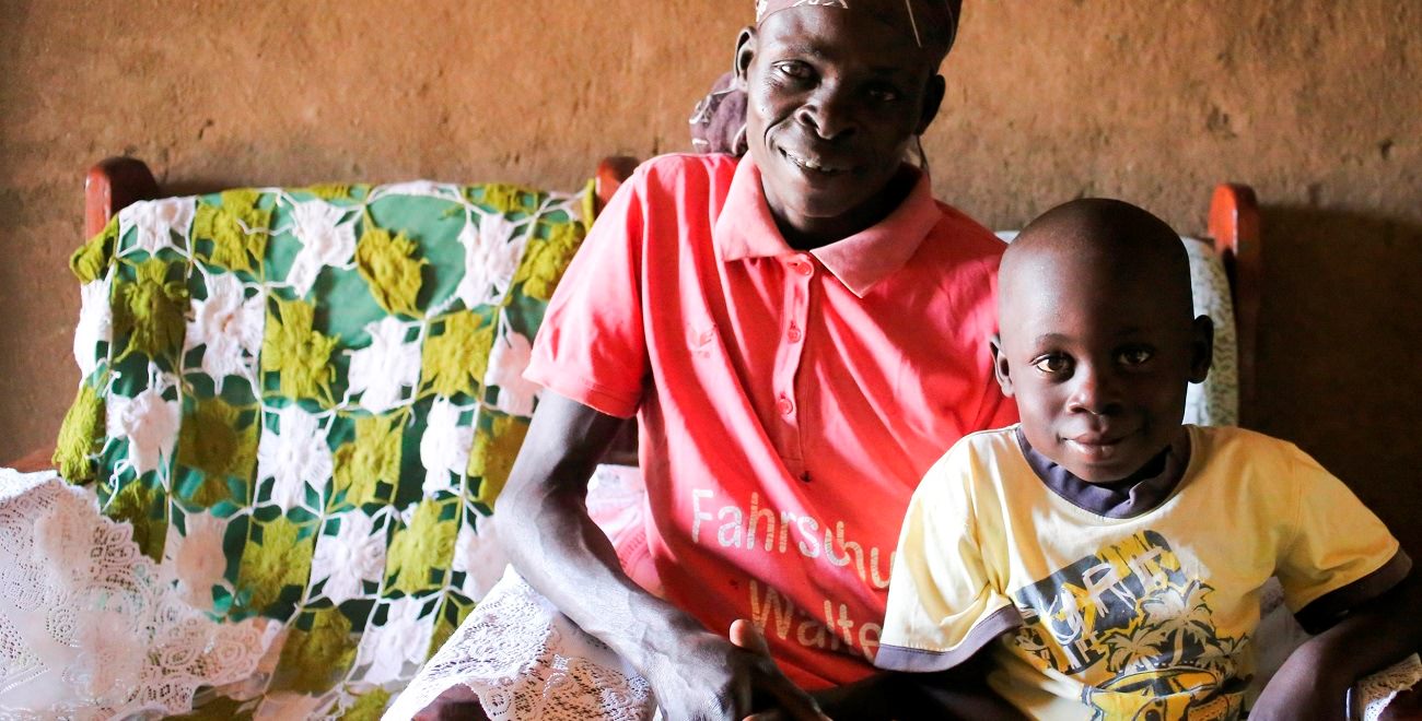 Ugandan sponsored child Moses with his mum