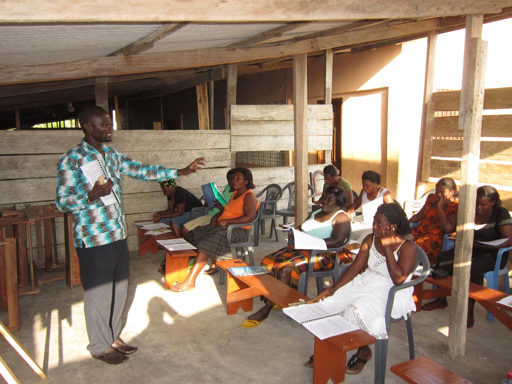 Compassion project worker Henry giving child protectiopn training