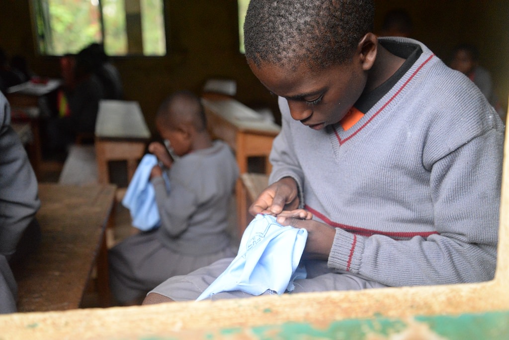 Tailoring lesson Uganda