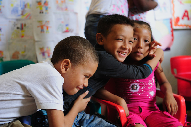 Colombian children hugging