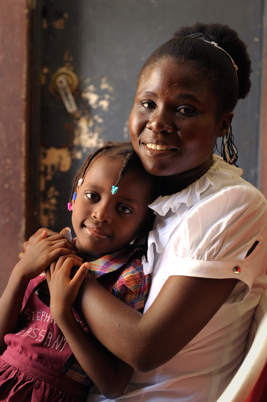 Haiti siblings hug