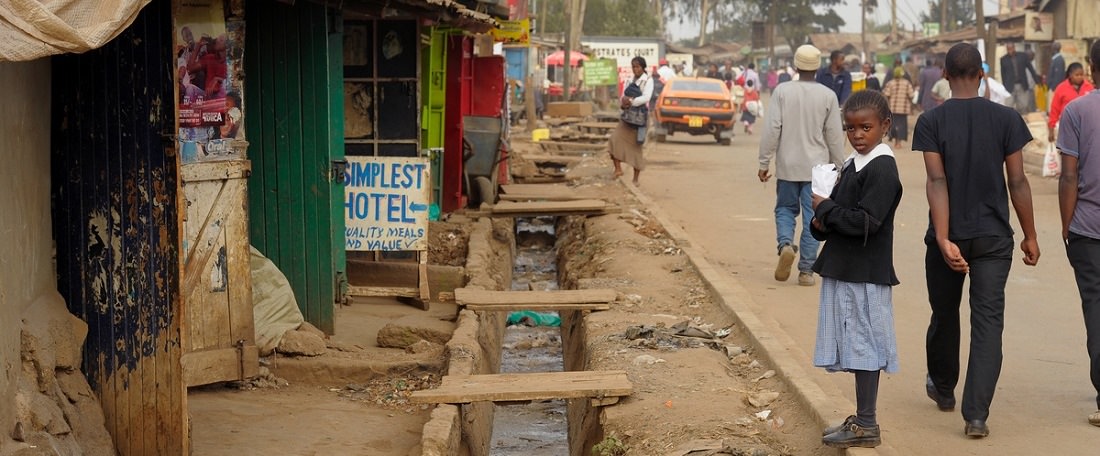 Kenyan girl by sewer