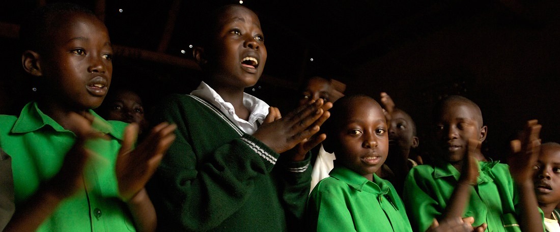 Rwandan children in line singing