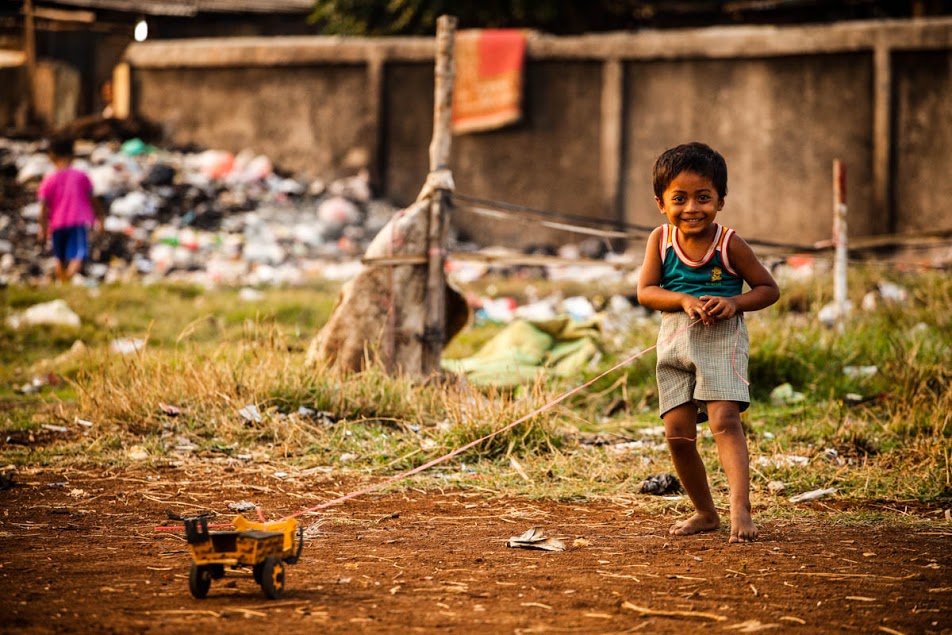 Children poverty playing toys hi-res stock photography and images - Alamy