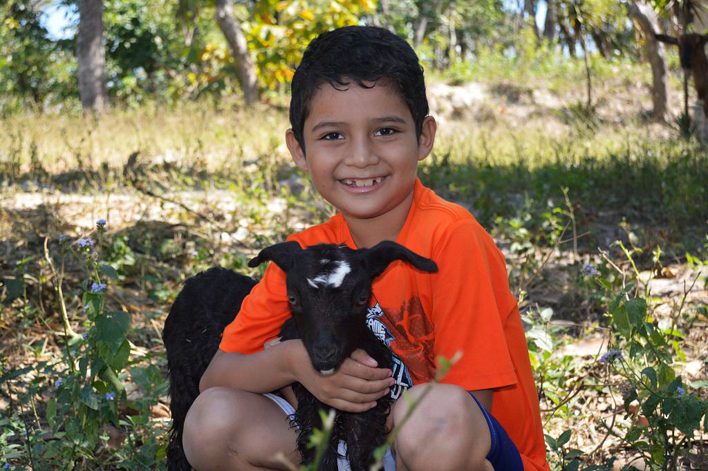 Cruz with a goat