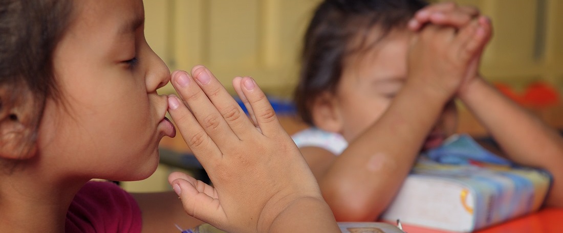 Praying in El Salvador