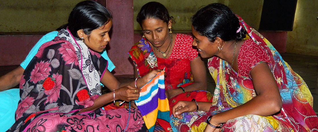 Indian mothers learning to sew