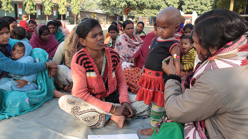 Using a mid arm circumference tape, mother's were trained to monitor their babies' progress.