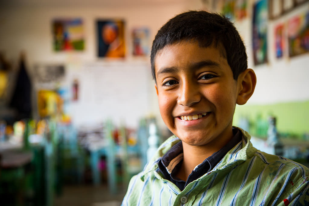 Child artist Hector from Mexico smiling