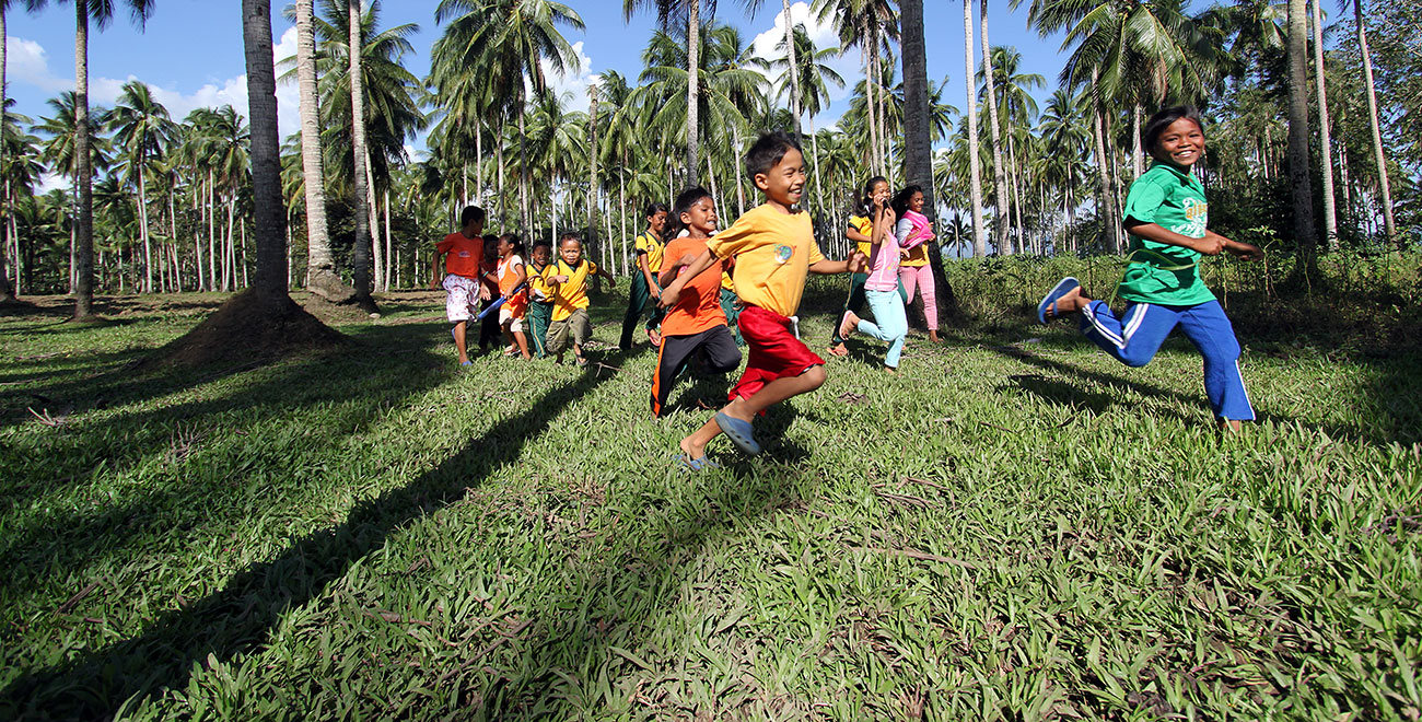 Children running in the Philippines