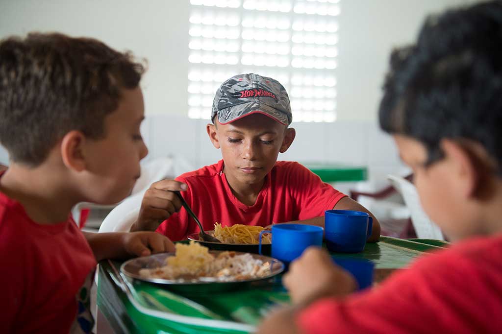 Eating lunch at the Compassion project