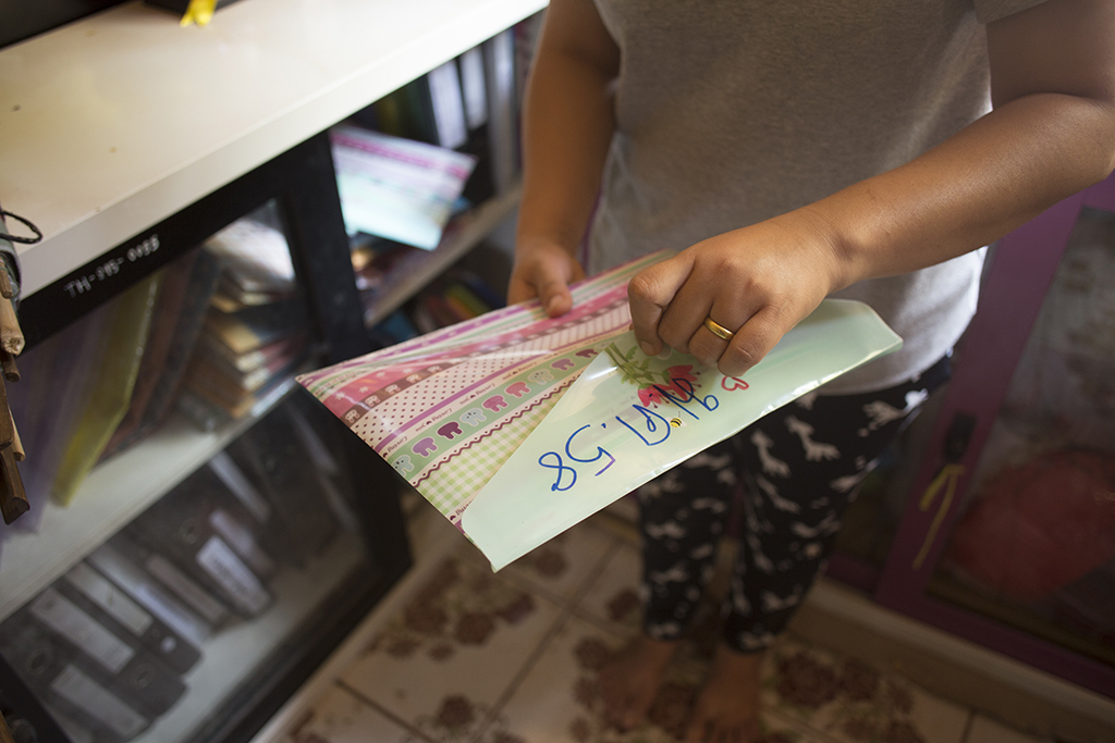 A colourful folder containing a transaction records.