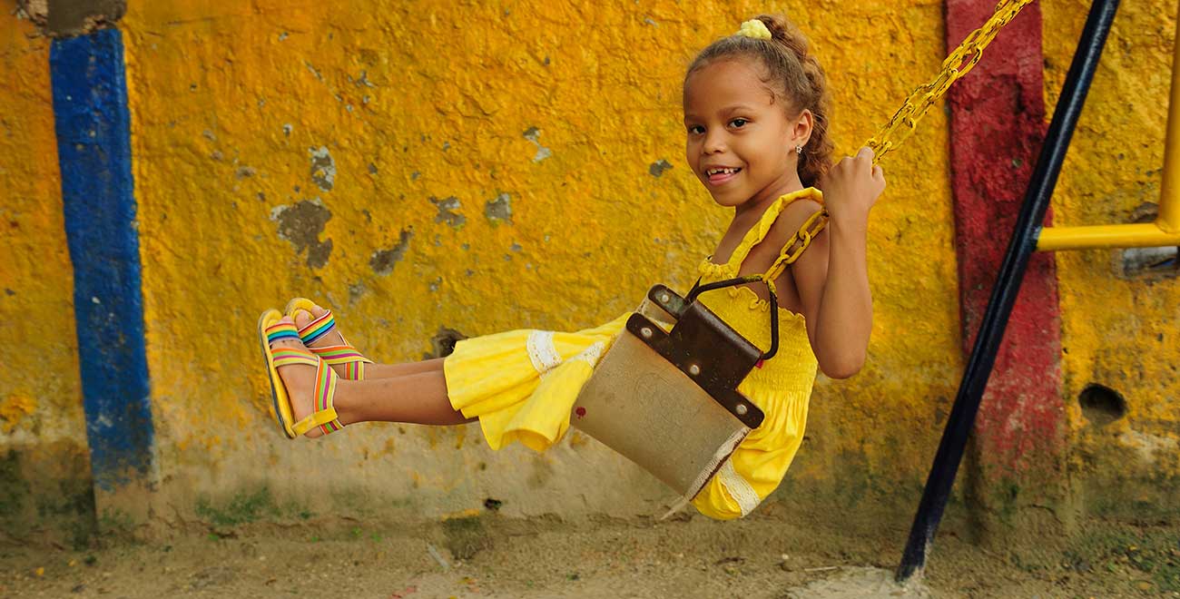 Girl on swing in Colombia