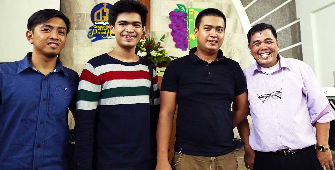 Philippines Pastor with his sons