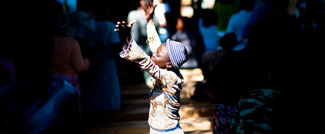 Haitian lady praying