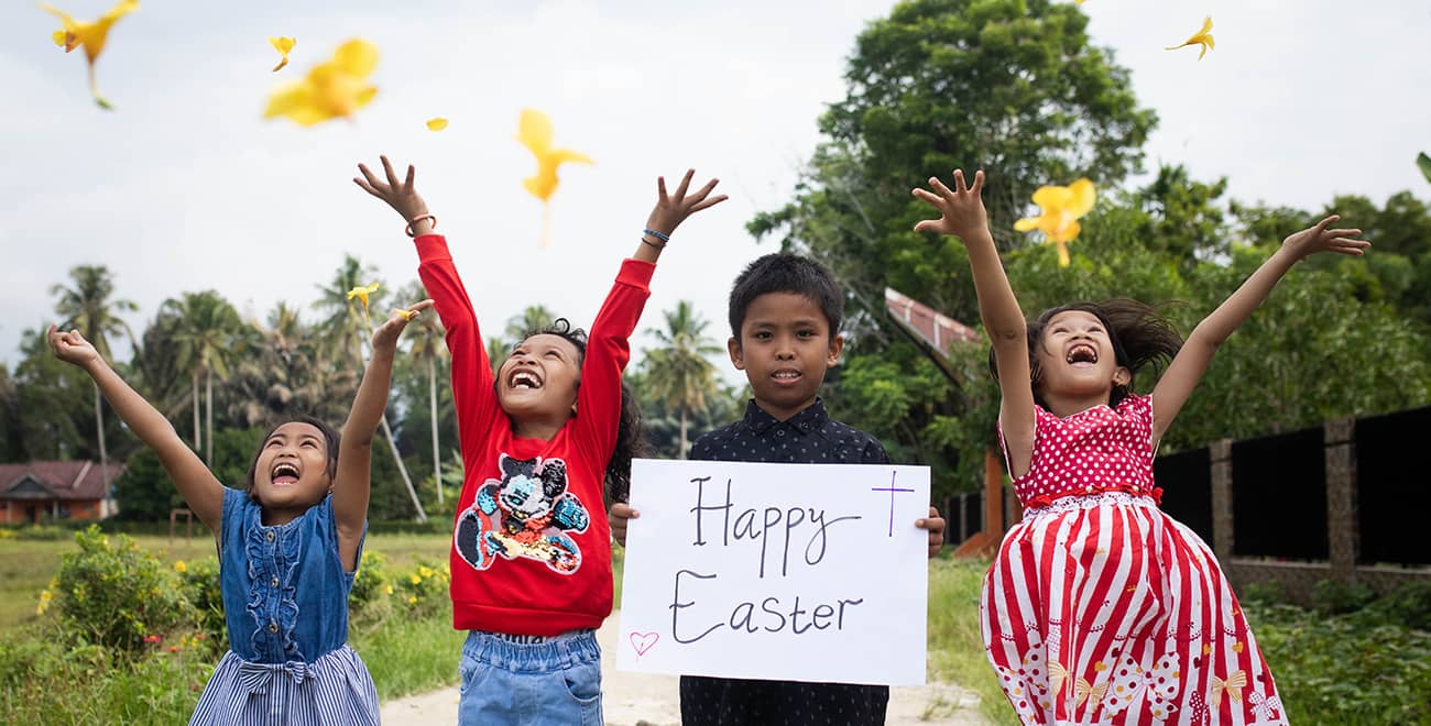 Children with Easter-banner